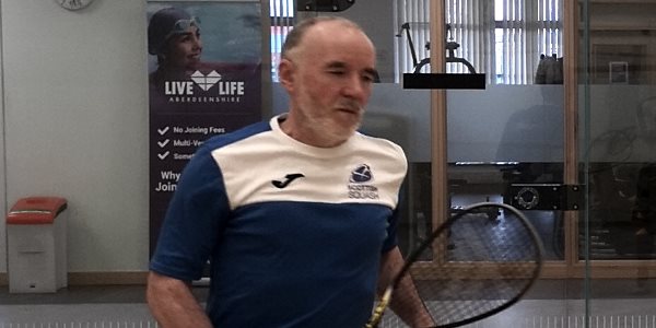 David Sheard playing squash