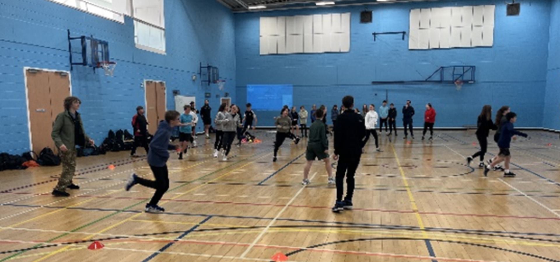 A group of pupils in the sports hall