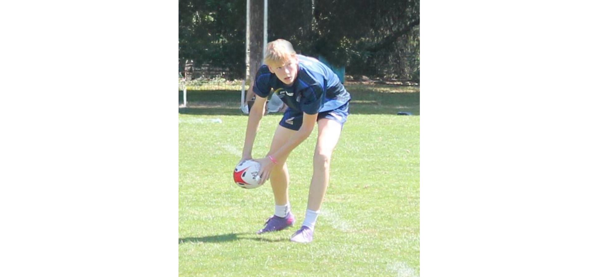 Sebastian playing rugby