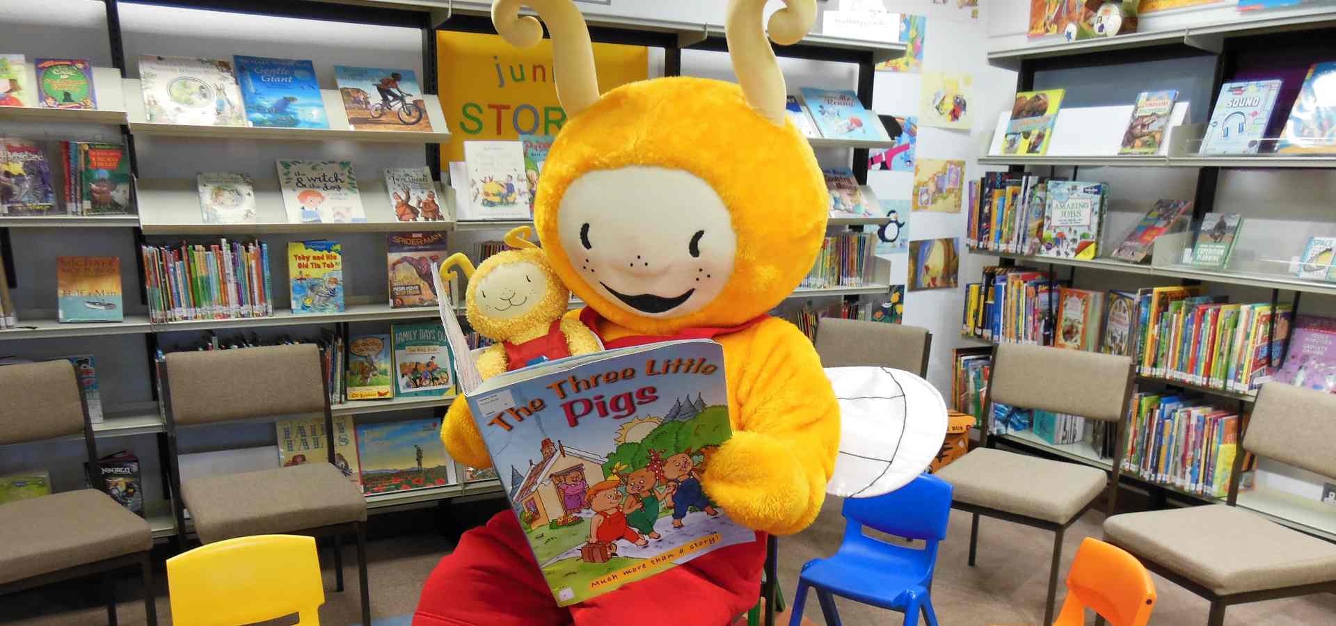 Bookbug reading a story