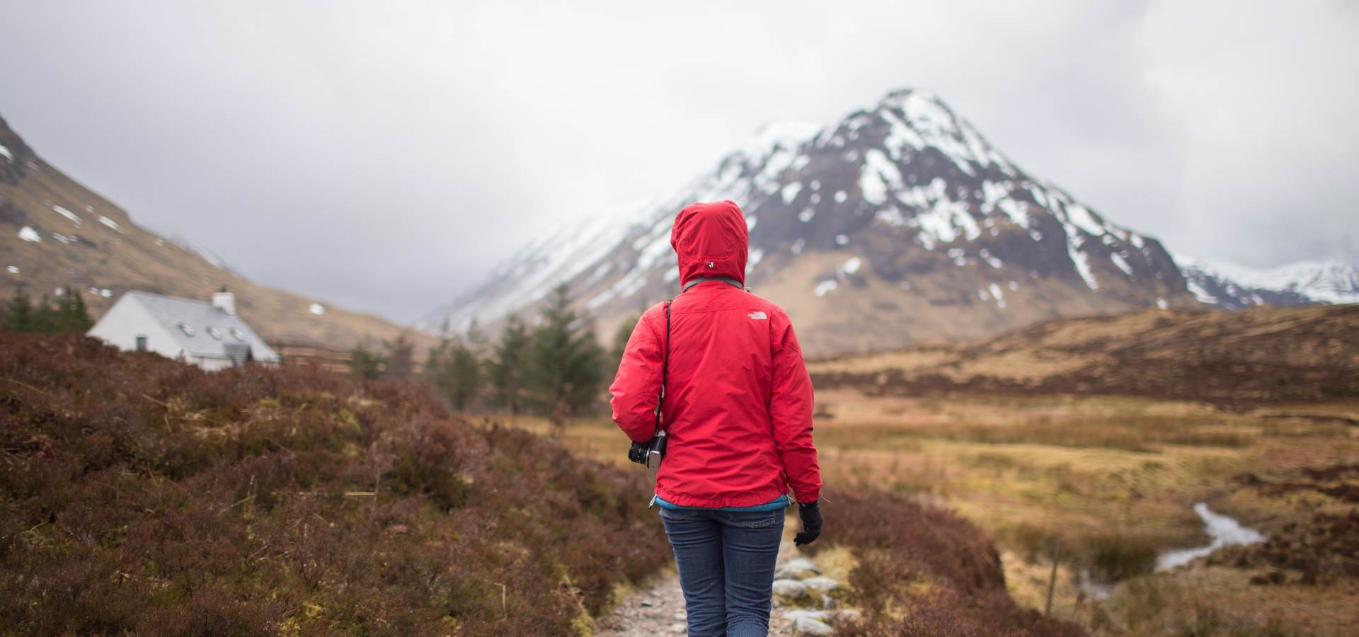 Person walking up a mountain