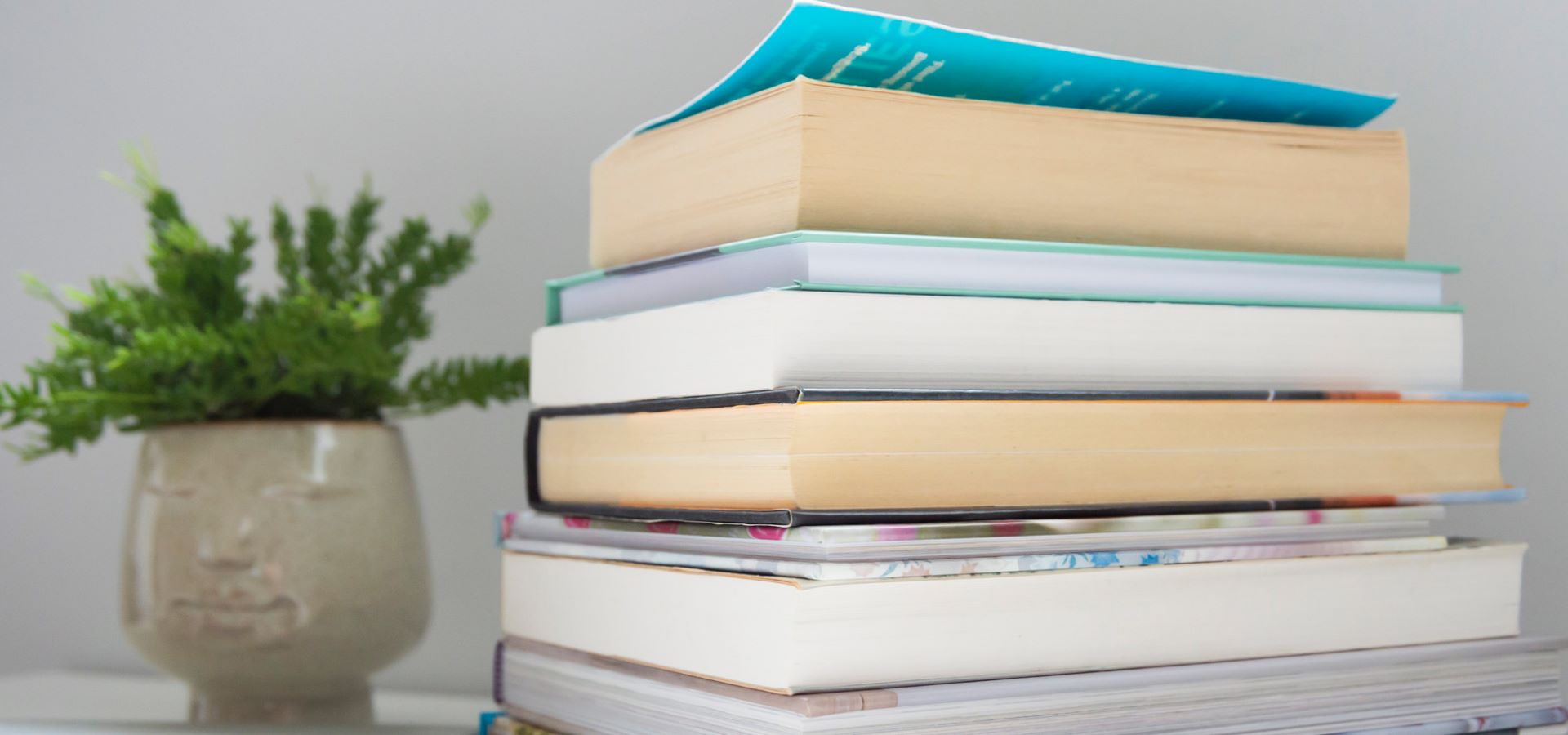 A pile of books on a table